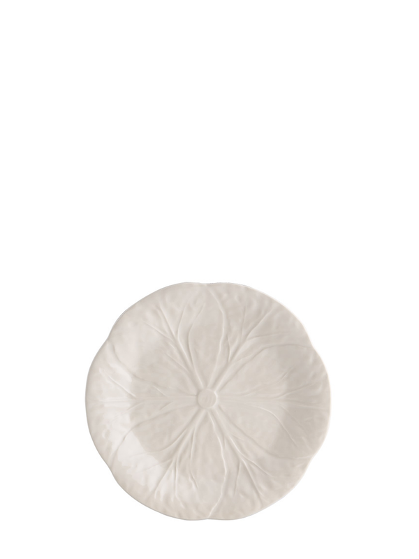 A small round ceramic plate with a hand-painted leaf pattern in ivory color, part of the Cabbage Collection.