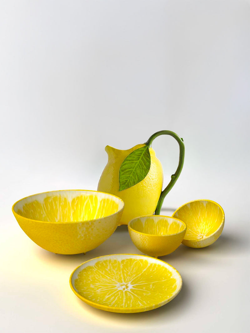 Bordallo Pinheiro Lemon collection including pitcher, bowls and dishes