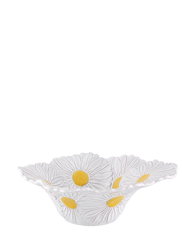 A ceramic salad bowl with detailed white and yellow daisy patterns on the exterior.