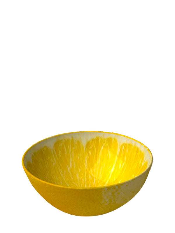 Yellow ceramic bowl on a white background