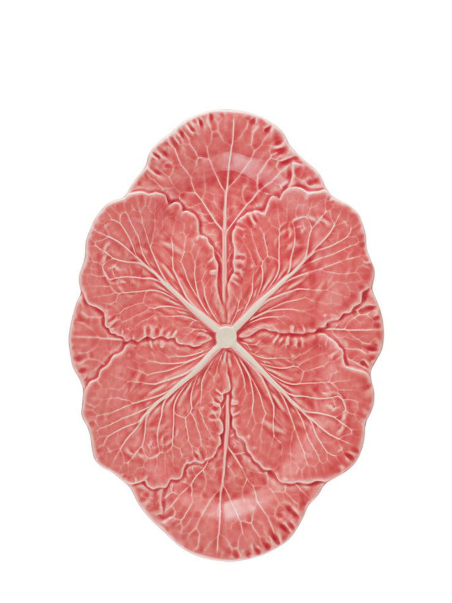 An oval-shaped ceramic plate designed to look like a leafy cabbage, in a beautiful rose pink shade like red grapefruit, featuring a textured pinkish-red rind with lighter pink inner flesh details, shown on a solid white background.
