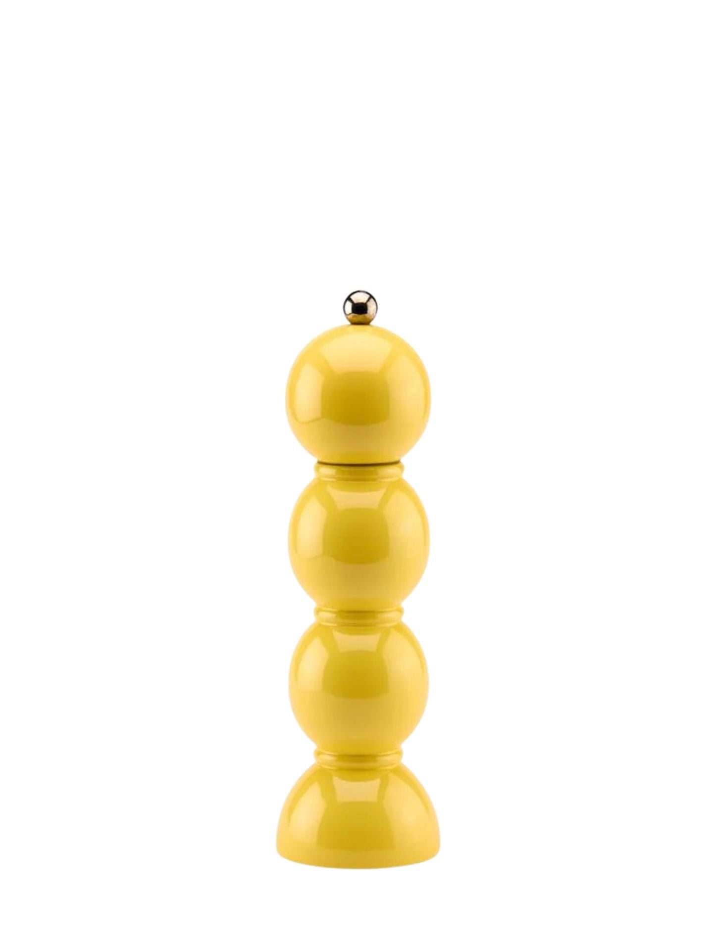 Yellow pepper mill on a white background