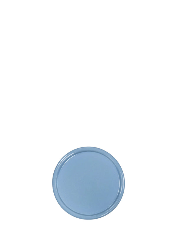 A single round plate in a light dusty blue color, photographed from directly above on a solid white background.