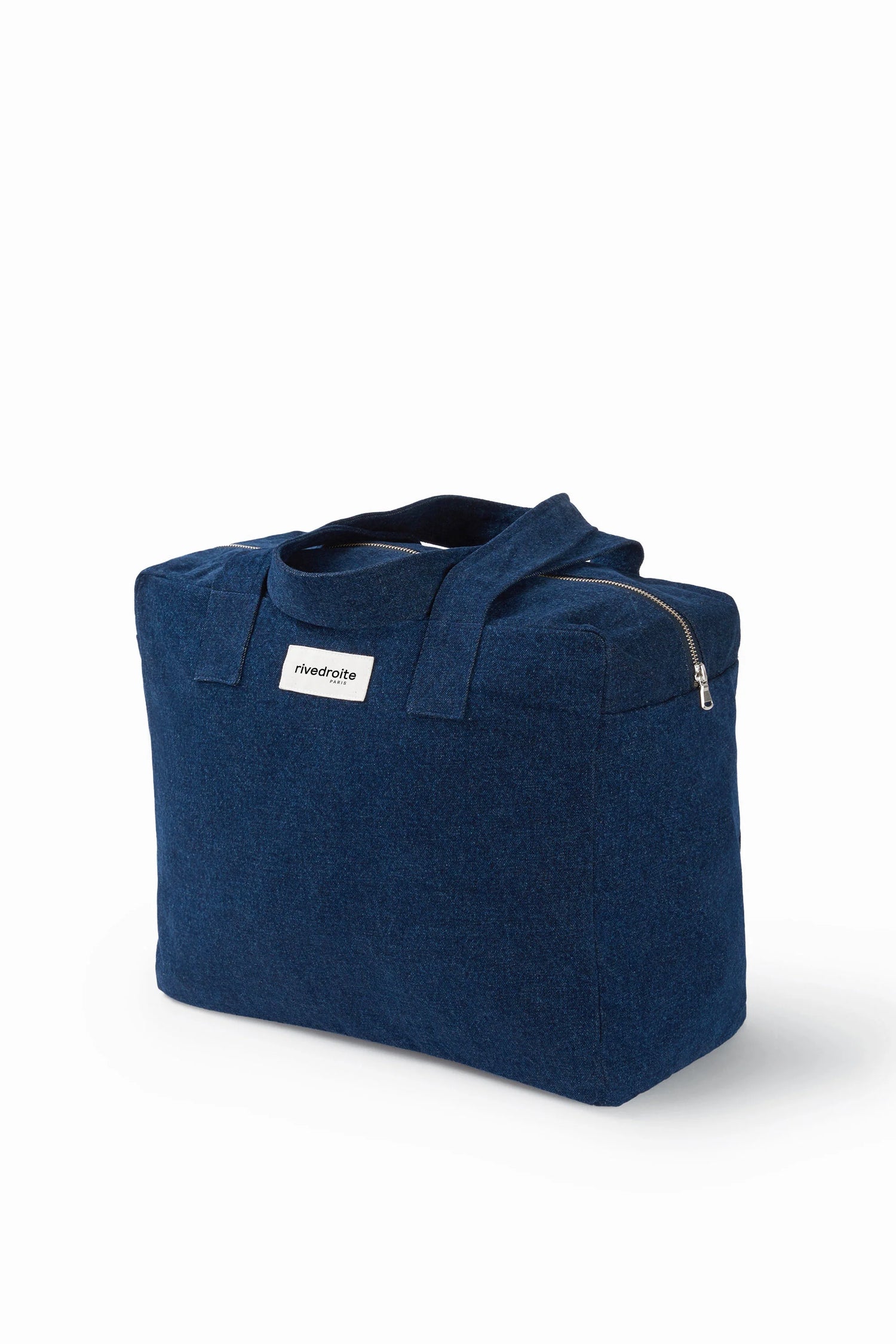 Blue tote bag with a visible brand label on a white background
