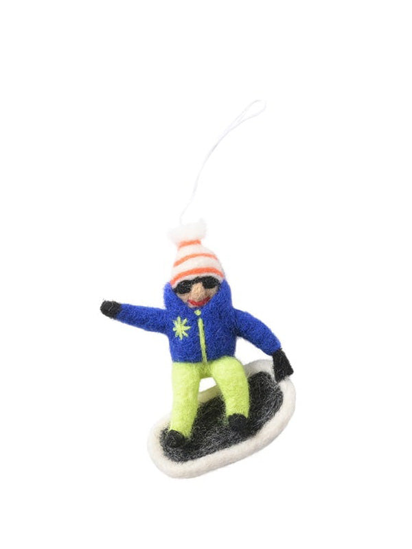Decorative ornament of a person snowboarding on a white background