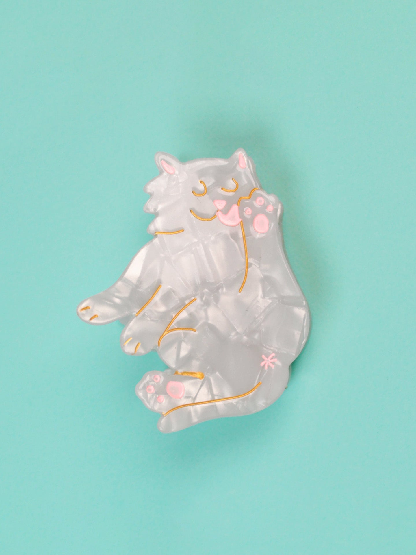 White cat hair claw