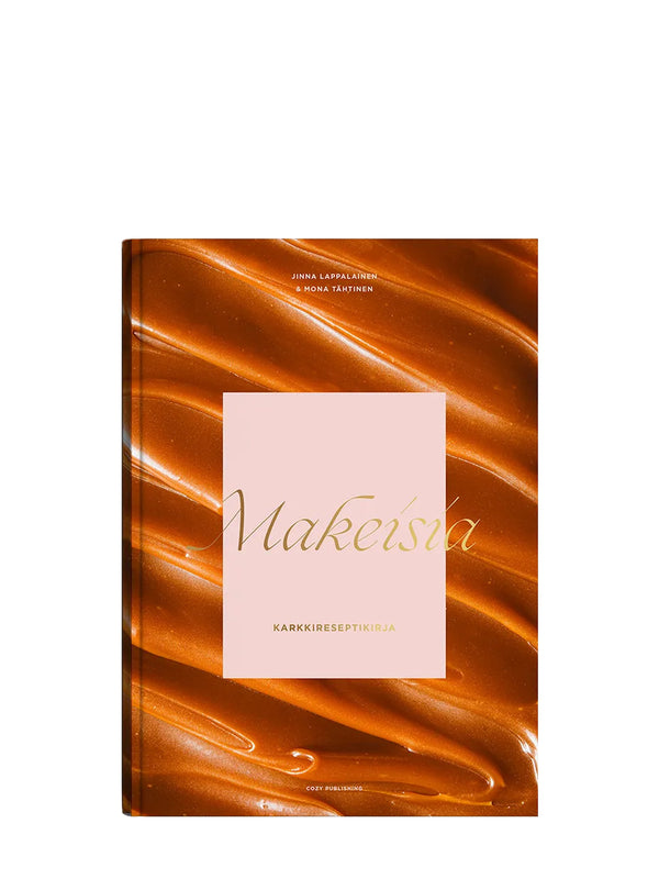 Book titled 'Makeista' with a gold and brown abstract design on the cover.