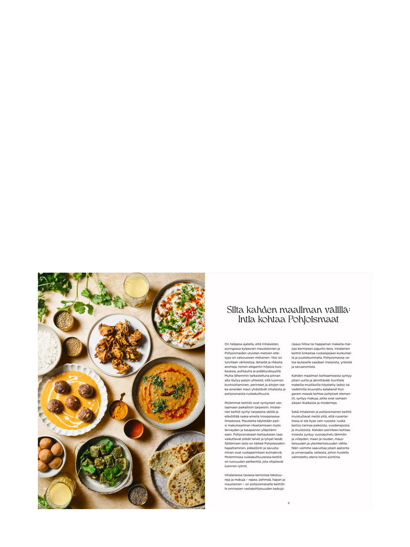 A page spread with a colorful overhead food spread of different Indian or Nepalese dishes with fresh herbs on the left and text with a title 'Silta kahden maailman välillä: Intia kohtaa Pohjoismaat' on the right from a cookbook's introduction chapter.