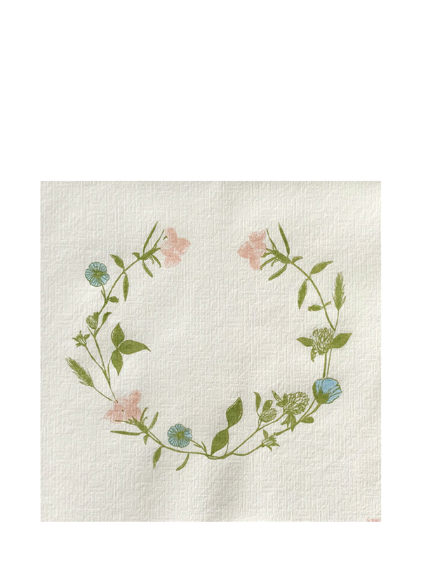 A white disposable dinner napkin with a floral wreath design in green and pink.