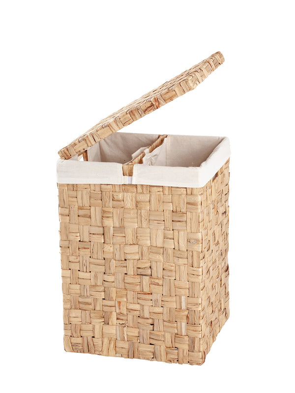 A rectangular woven natural fiber laundry hamper with a hinged lid and two inside compartments, shown open on a plain white background.