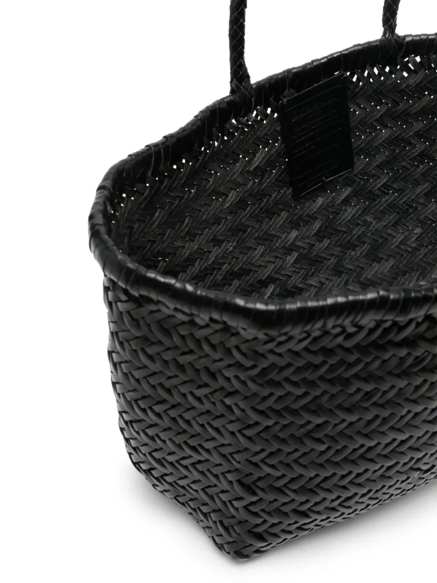 Black woven handbag with a handle on a white background