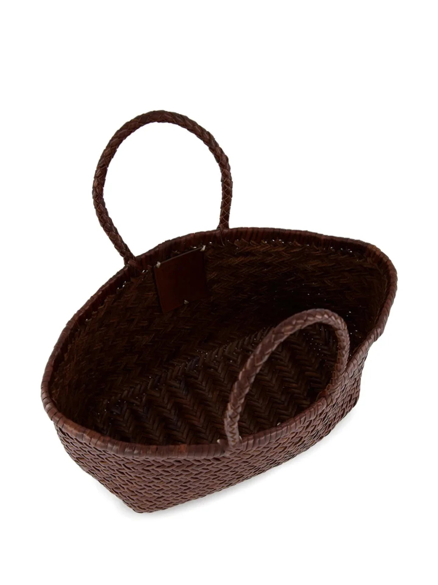 Brown woven basket with handles on a white background