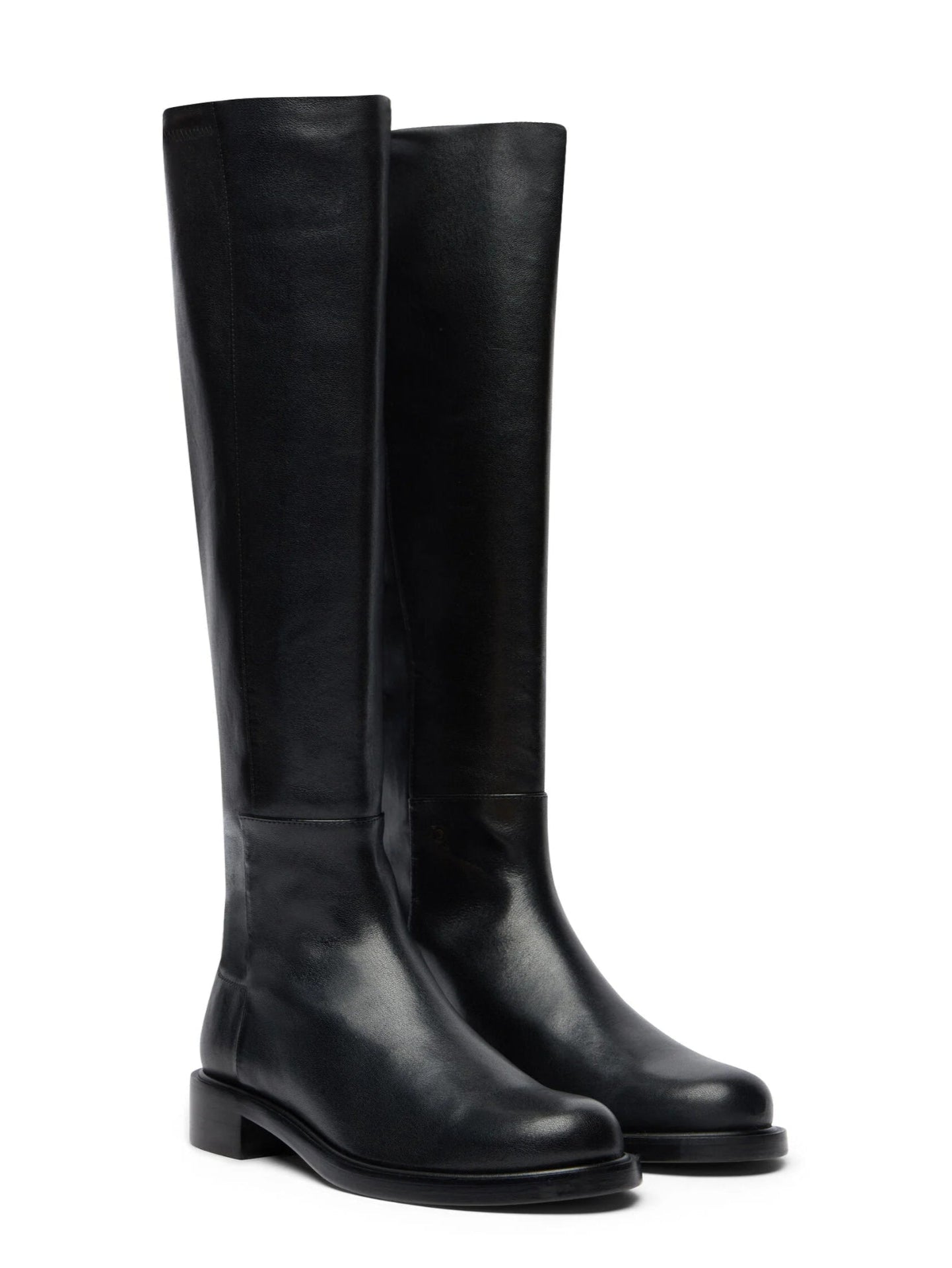 Pair of black knee-high boots on a white background