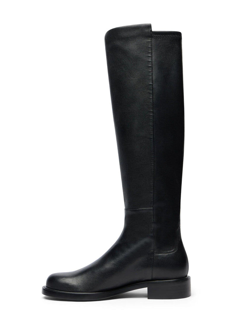 Black knee-high boot on a white background