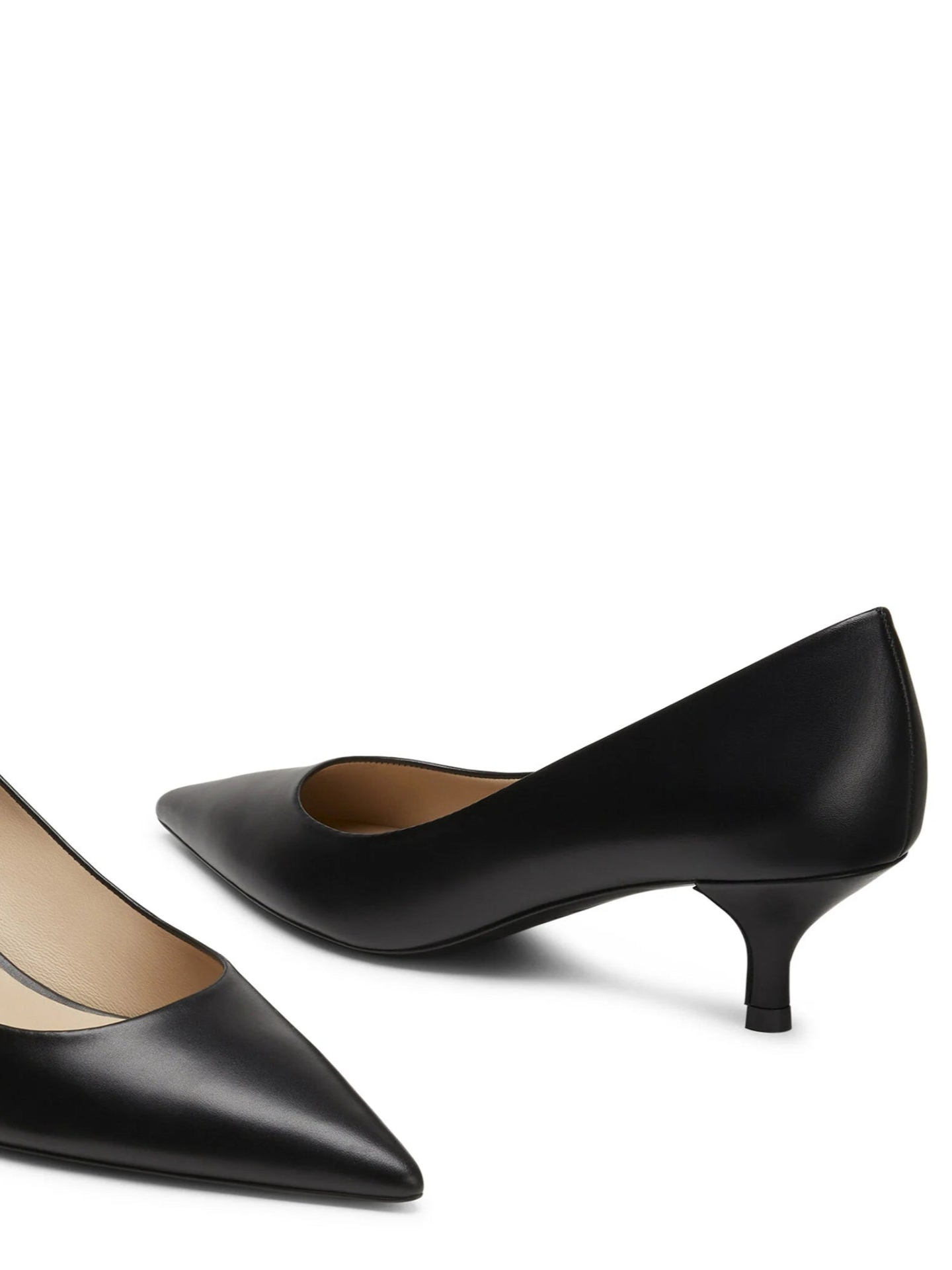 Black high-heeled shoes on a white background