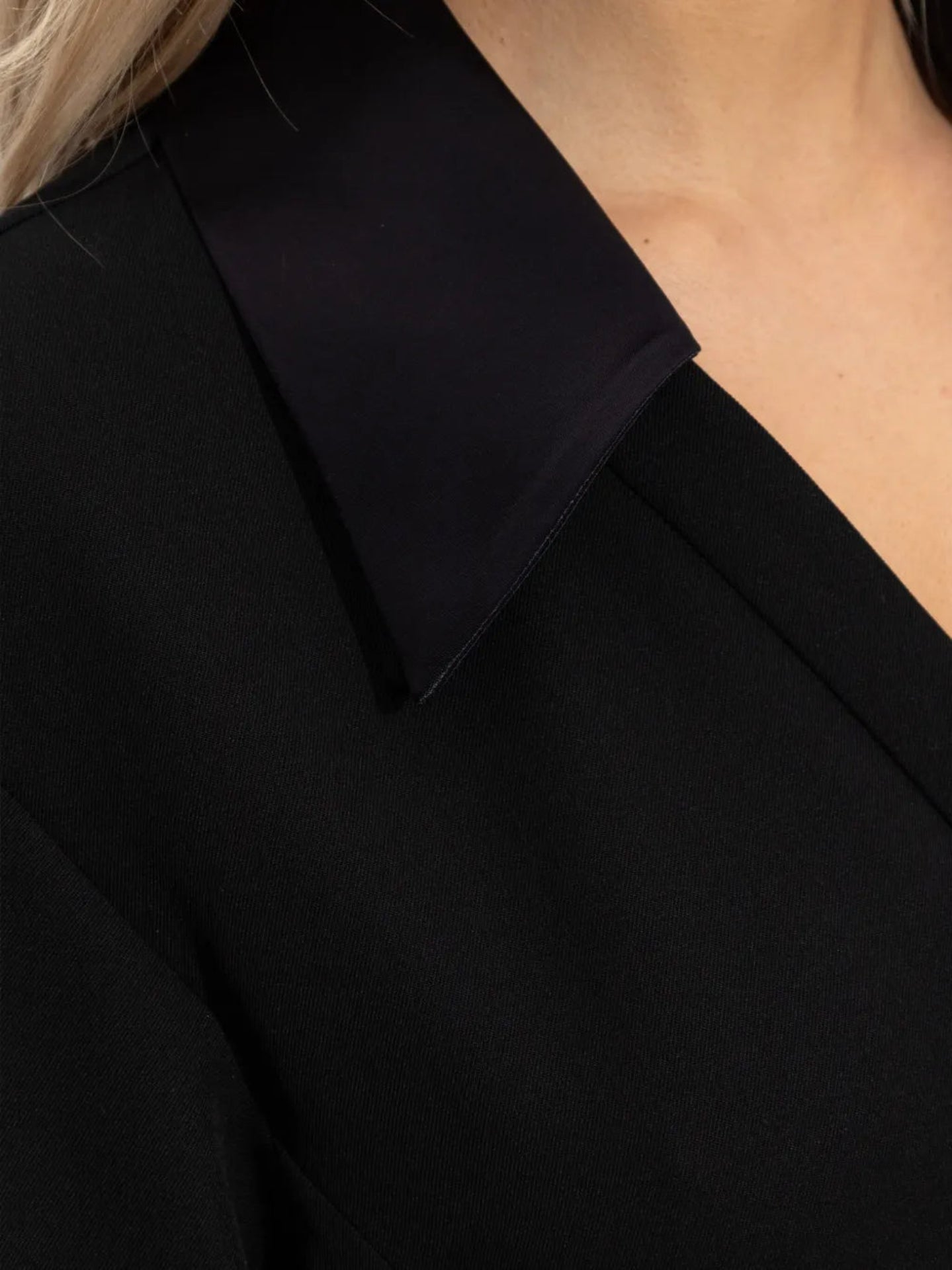 Close-up of a dress with a collar