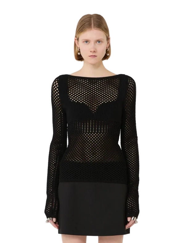 Black mesh sweater worn by a model on a white background