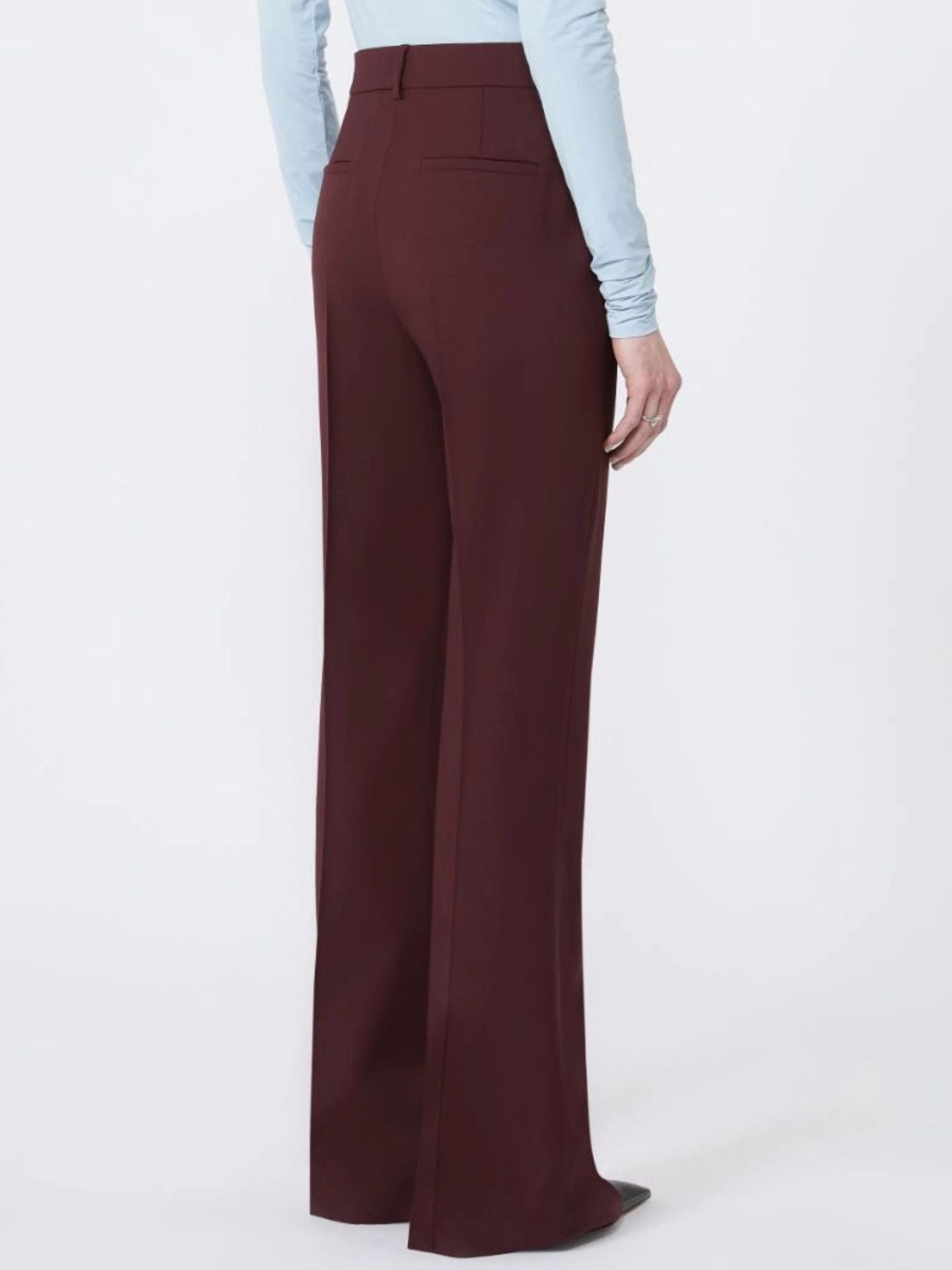 Maroon wide-leg pants worn by a person on a white background