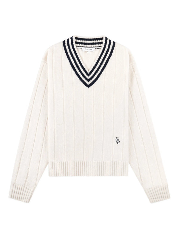 White sweater with a V-neck and black ribbed trim on a white background