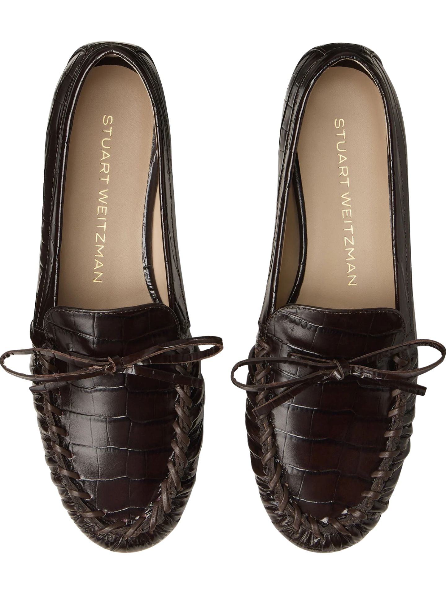 Brown leather loafer shoe on a white background