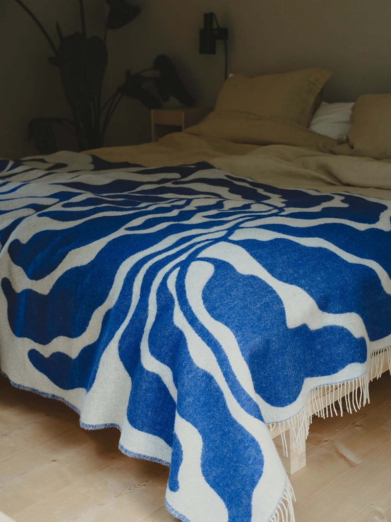 Leaves fringed wool throw bedspread by Linnéa Andersson, blue (130 x 220 cm)