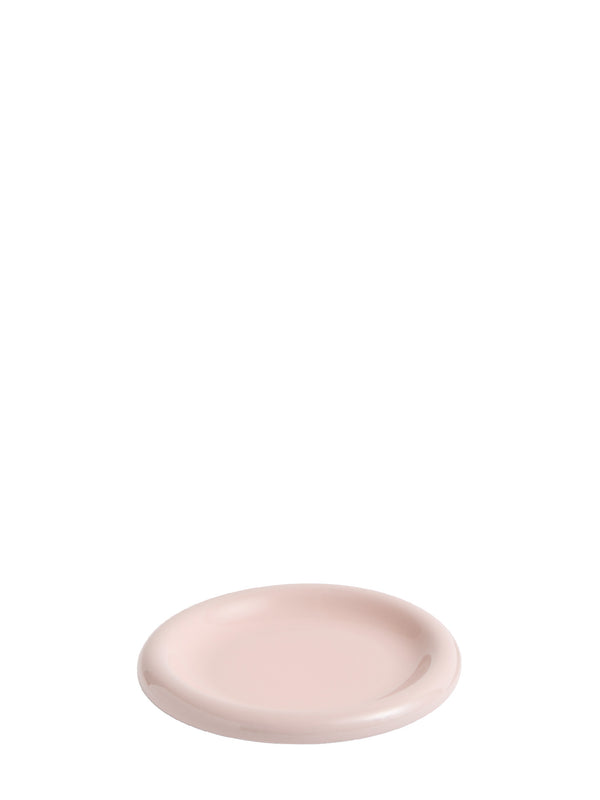 Pink ceramic round and small plate on a white background