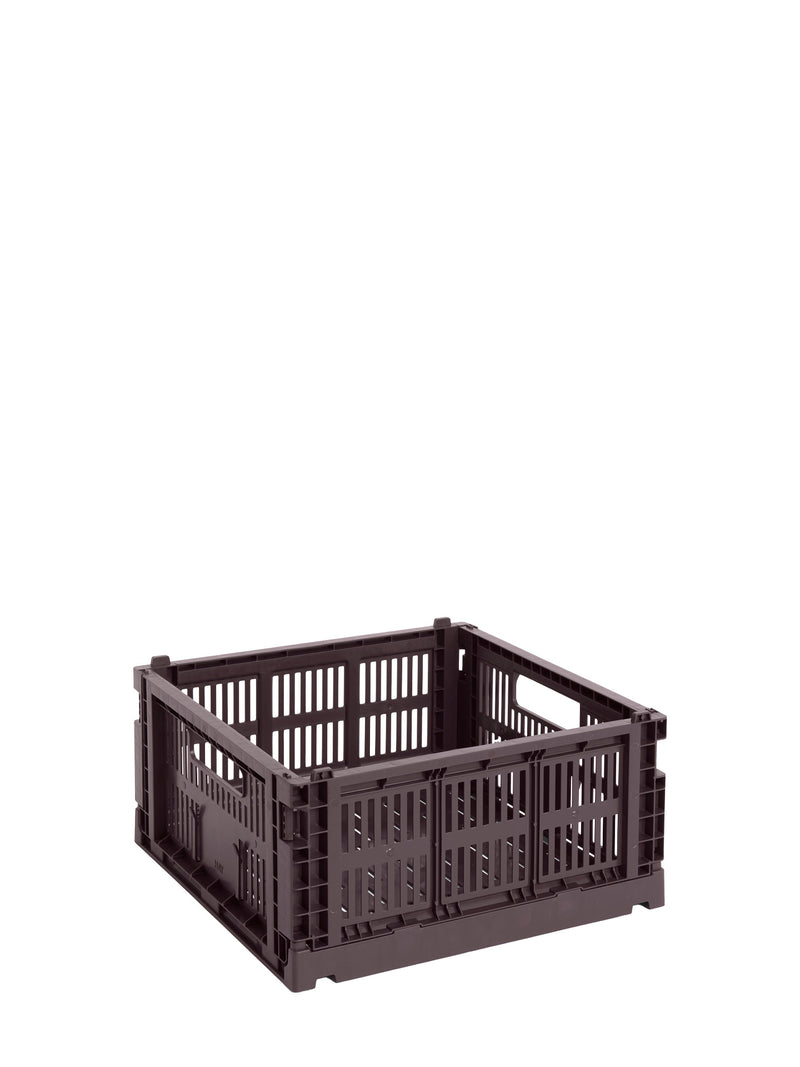 Brown plastic crate on a white background