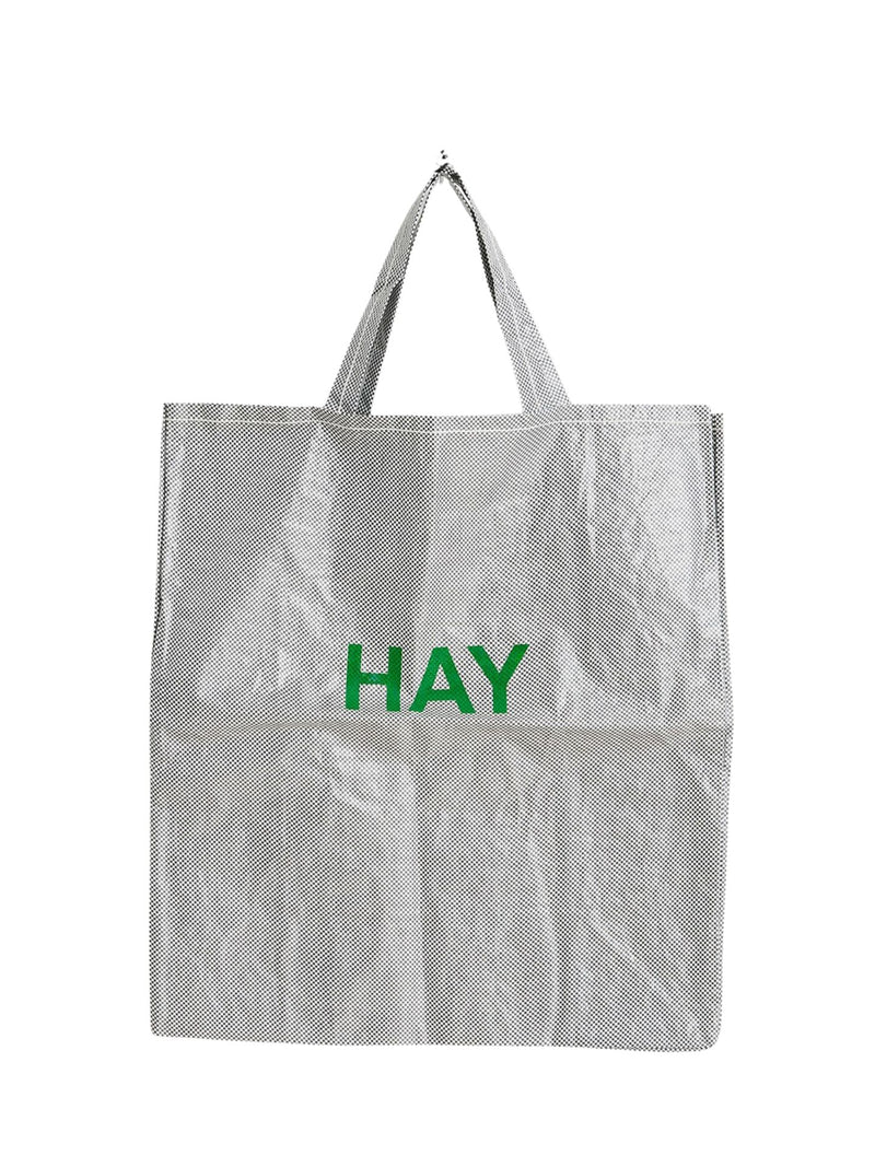 Gray tote bag with 'HAY' printed in green on a white background