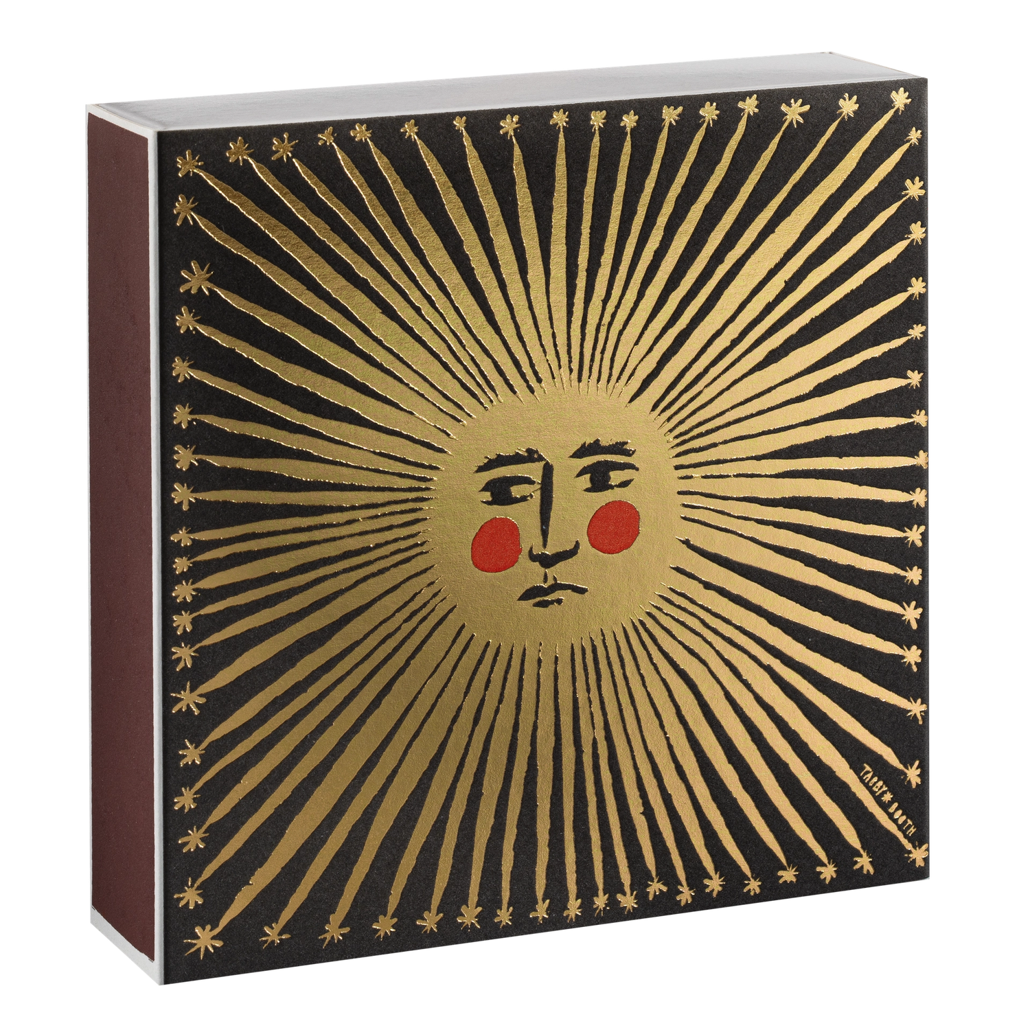 Decorative box with sun design and face on a black background