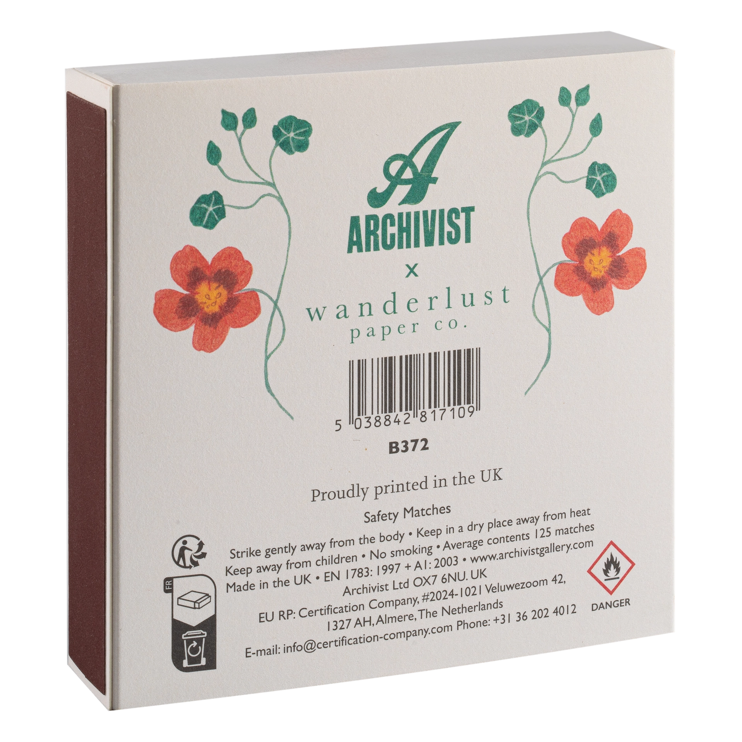 Box of matches with floral design and 'Archivist x Wanderlust Paper Co.' branding.