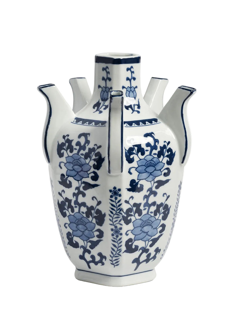 A white ceramic vase decorated with blue floral and vine patterns, shown on a plain white background.