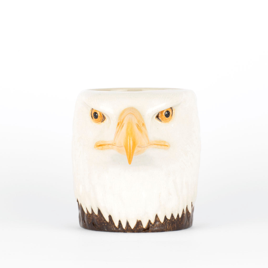 Ceramic mug with an eagle face design on a white background