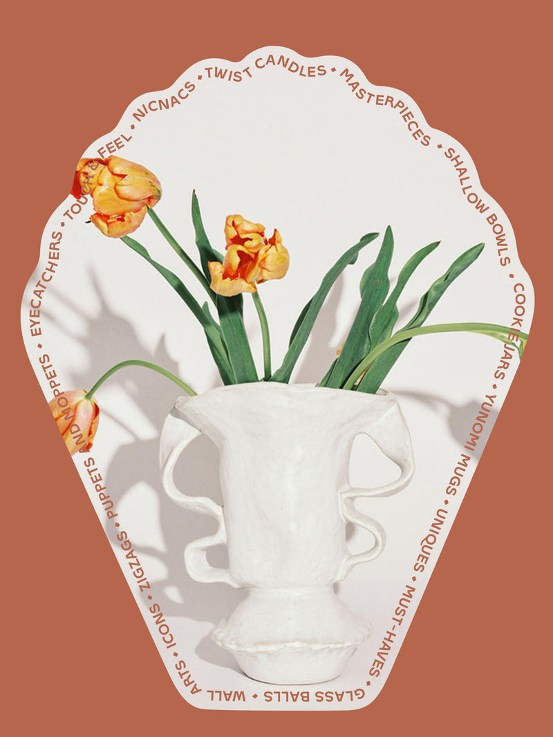 Decorative card with a white vase holding orange tulips on a brown background