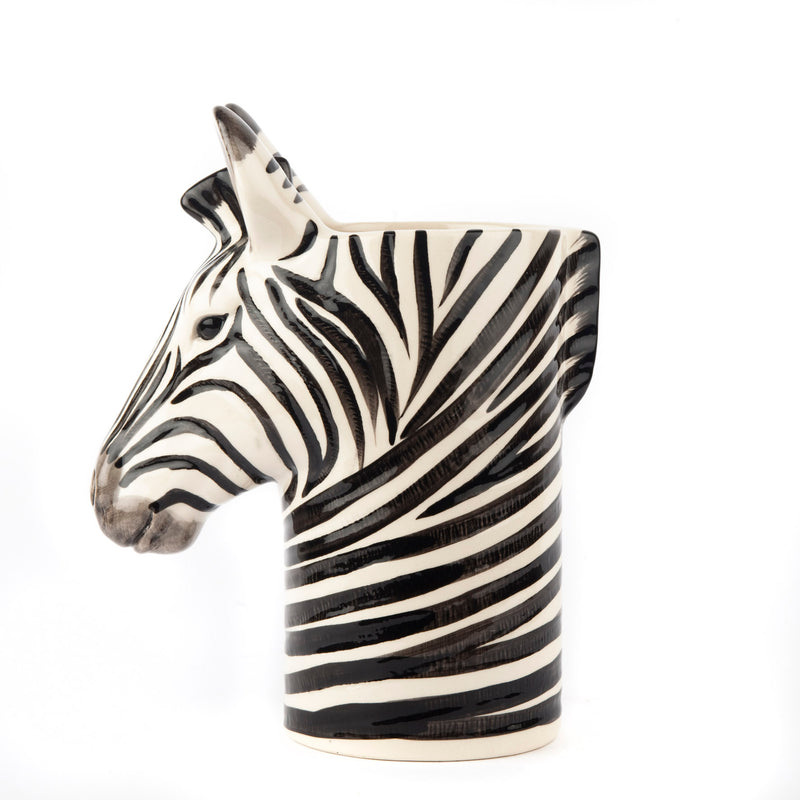 Zebra-shaped ceramic vase on a white background