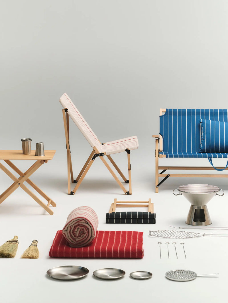 Hay collection of outdoor furniture and accessories on a light gray background