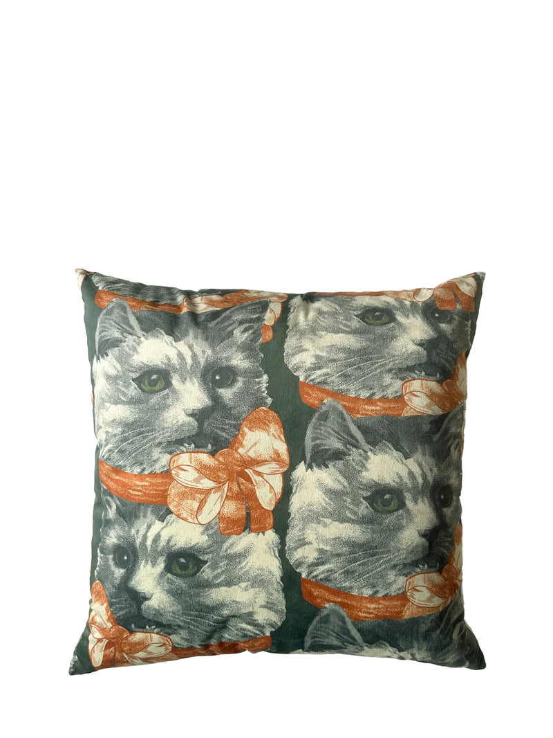 Decorative pillow with cat pattern on a white background