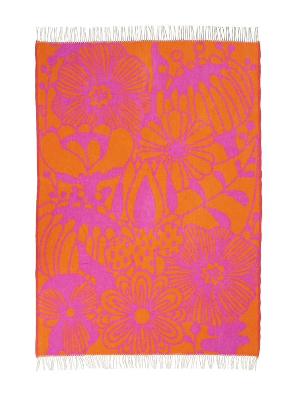 Floral patterned towel with pink and orange flowers on a white background