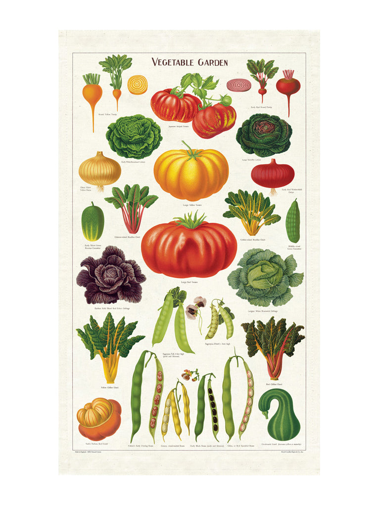 A multicolored kitchen towel with a vintage vegetable garden design, displayed on a plain background.