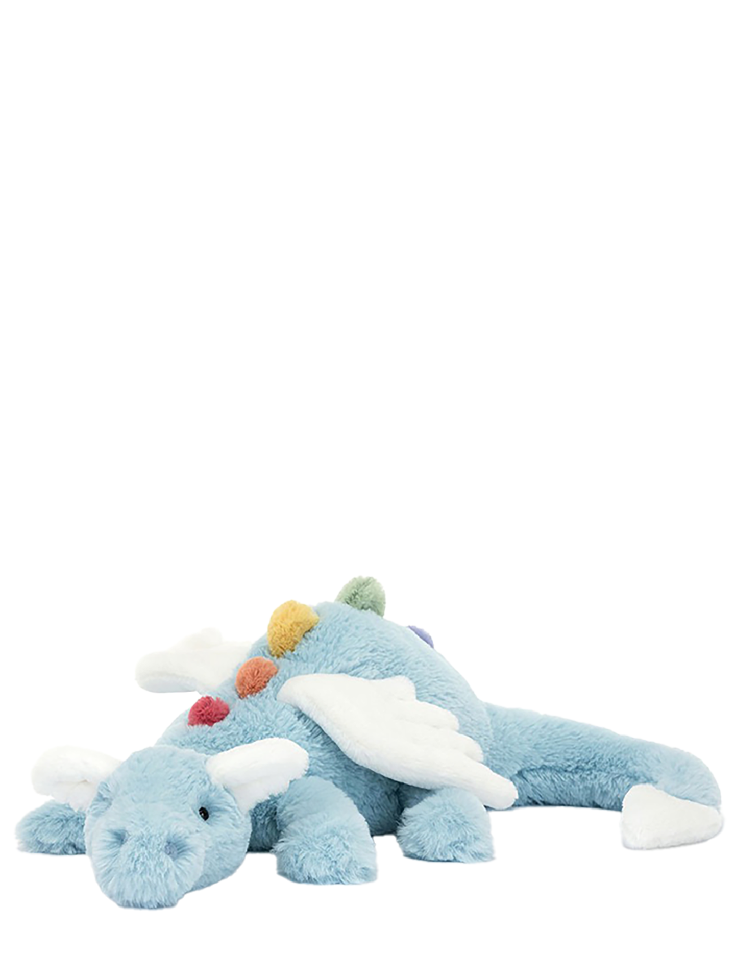 A large plush toy resembling a dragon with a long sky-blue body, soft rainbow spines, cloud-white wings, ears, and tail dart, with a cuddly snout and bobble nostrils.