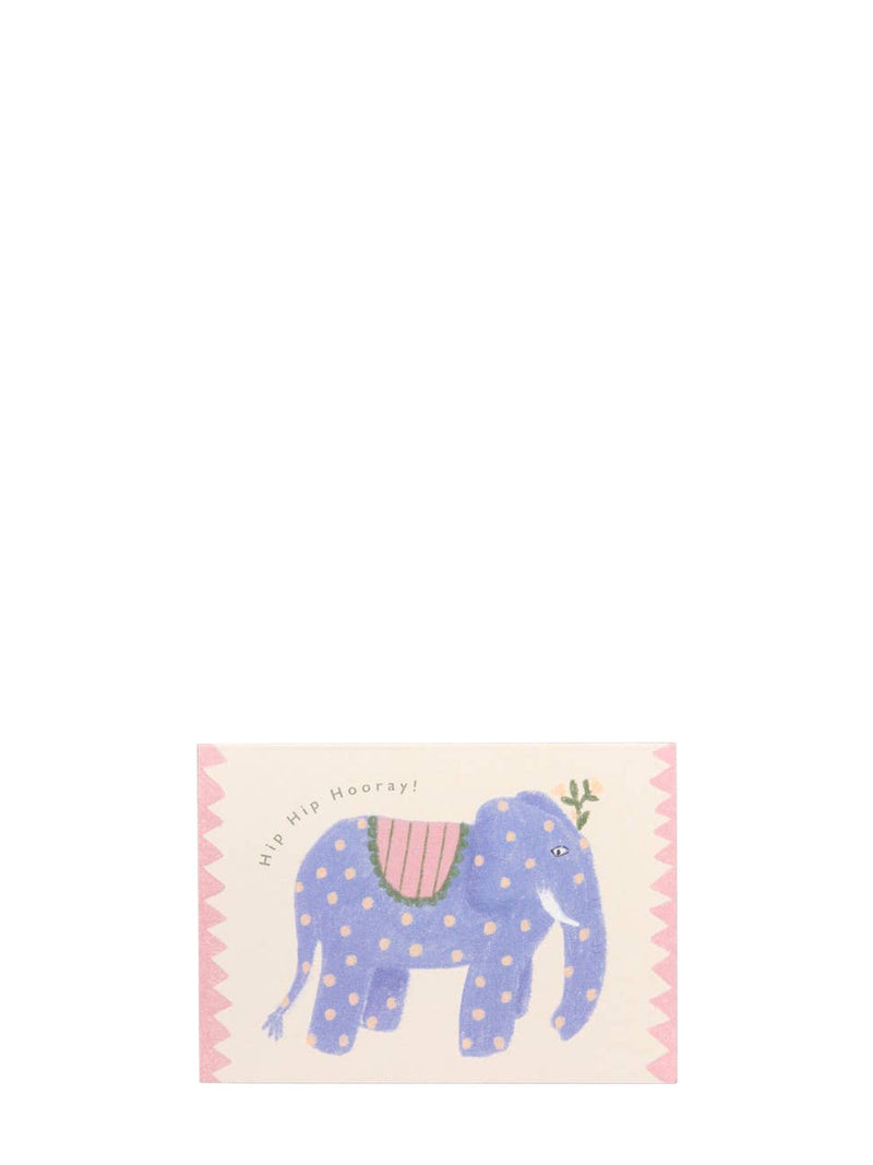 A small rectangular card or print featuring a whimsical blue elephant with white polka dots, a pink saddle, and the text 'Hip Hip Hooray!' on a pale pink background with a zigzag border.