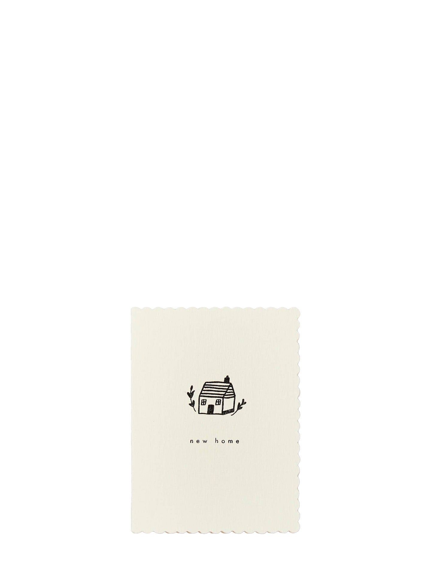 An off-white rectangular card with scalloped edges, featuring a small black line drawing of a house and the text 'new home' centered below it, set against a solid white background.