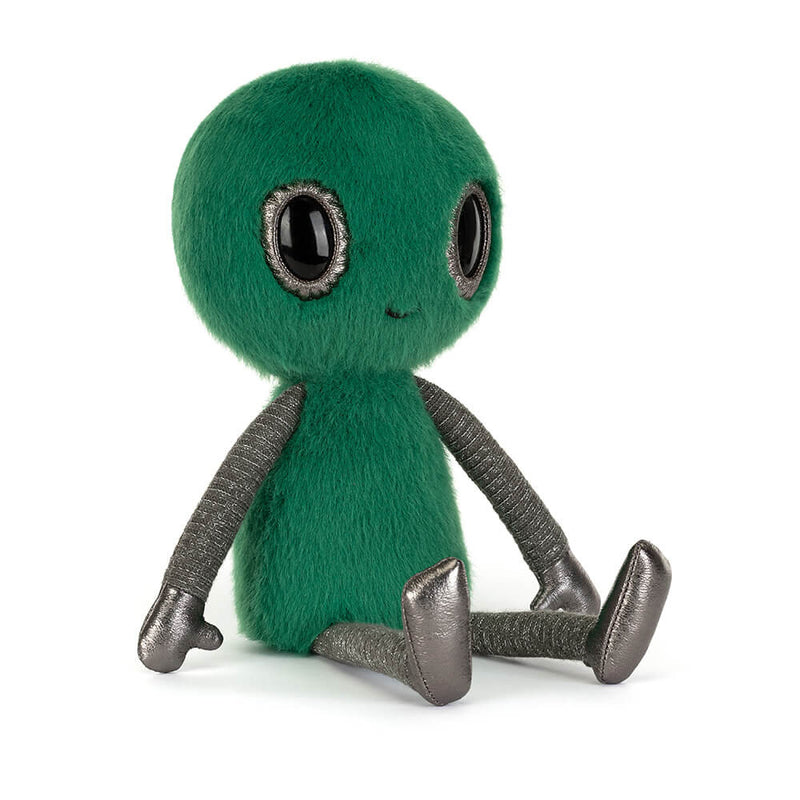 Green alien plush toy with black eyes on a white background