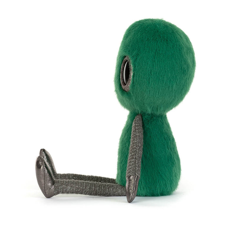 Green plush toy with a long tail on a white background