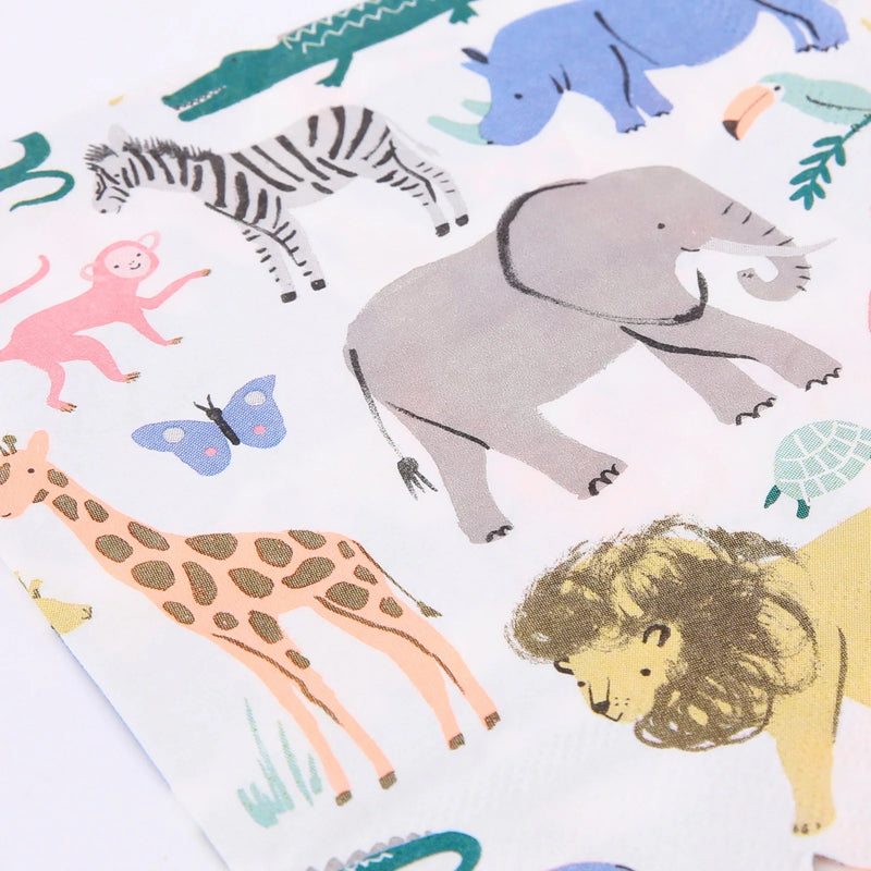 Children's fabric with colorful animal illustrations including a giraffe, elephant, zebra, and lion.