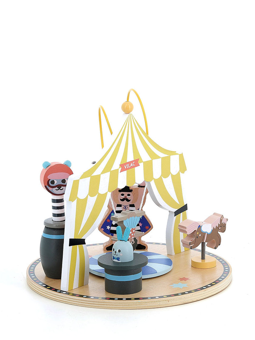 Toy circus with characters and a tent on a white background