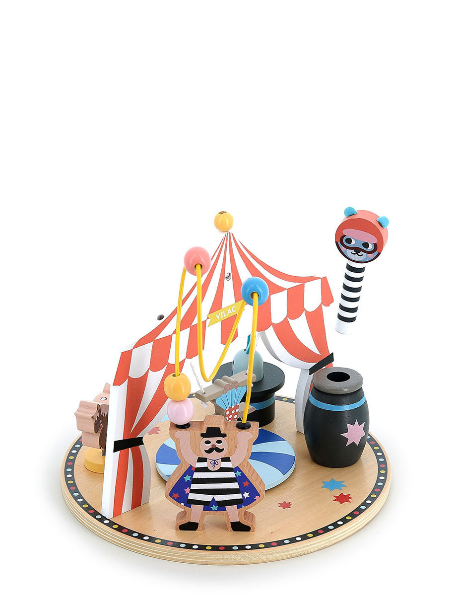 Wooden toy set with circus theme on a white background