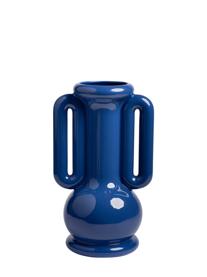 A glossy cobalt blue ceramic vase with a very high slender neck, rounded lip, bulbous bottom and two elongated integrated handles and a rounded base, photographed against a solid white background.