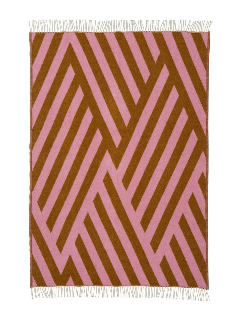 Wool throw with pink and brown chevron pattern designed by Maxjenny for Klippan Yllefabrik on a white background
