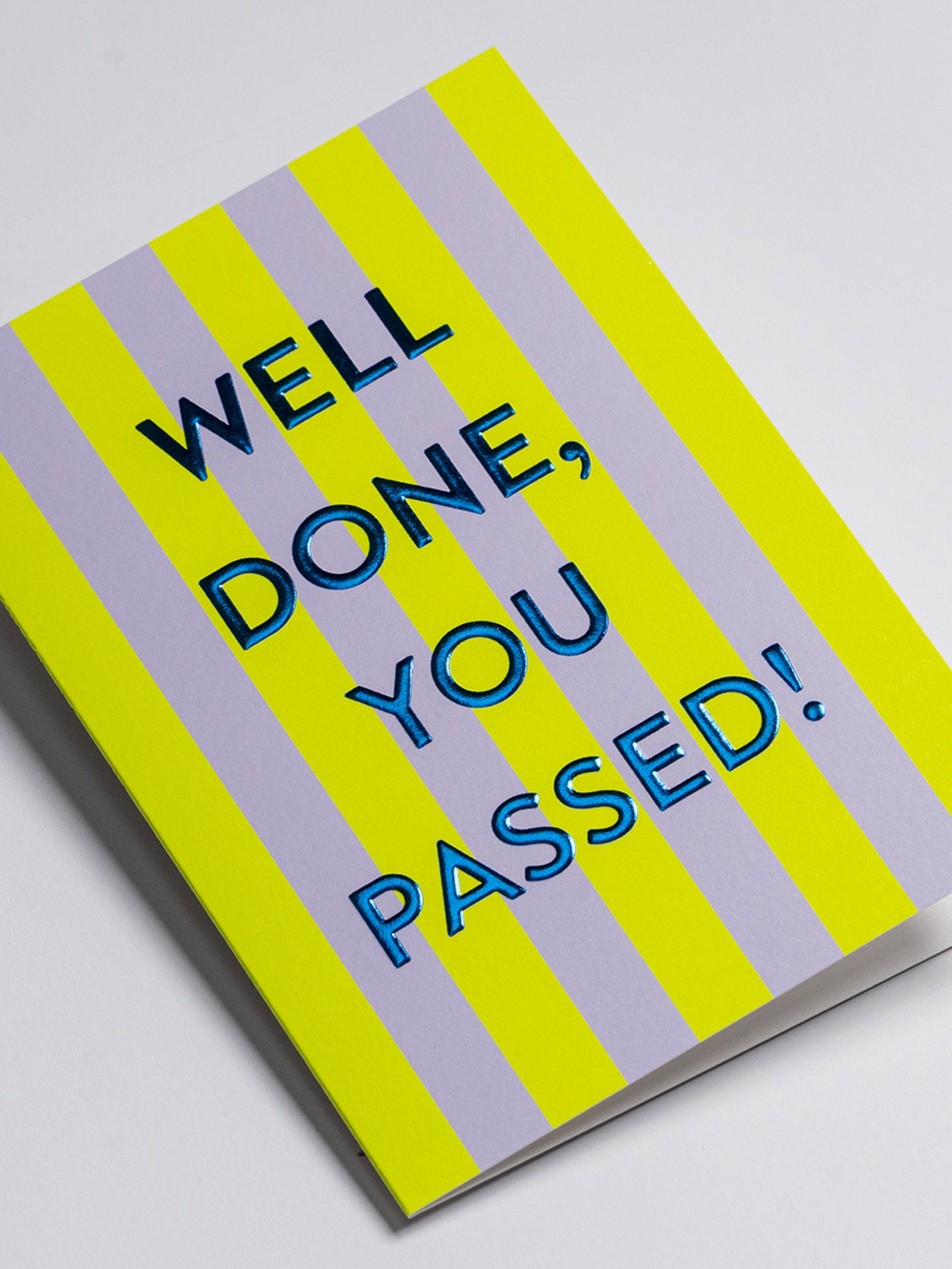 Well done you passed! striped yellow-lilac graduation card