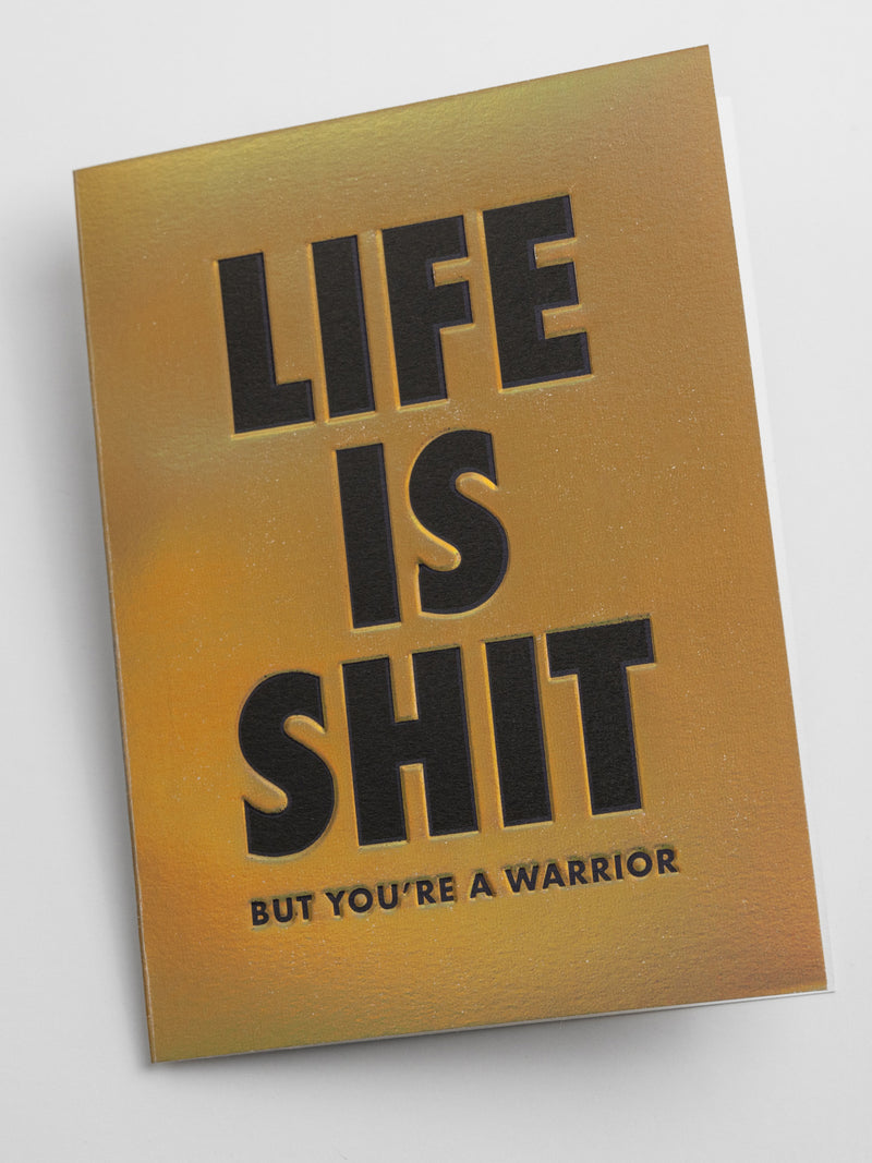 Gold greeting card with black text on a white background